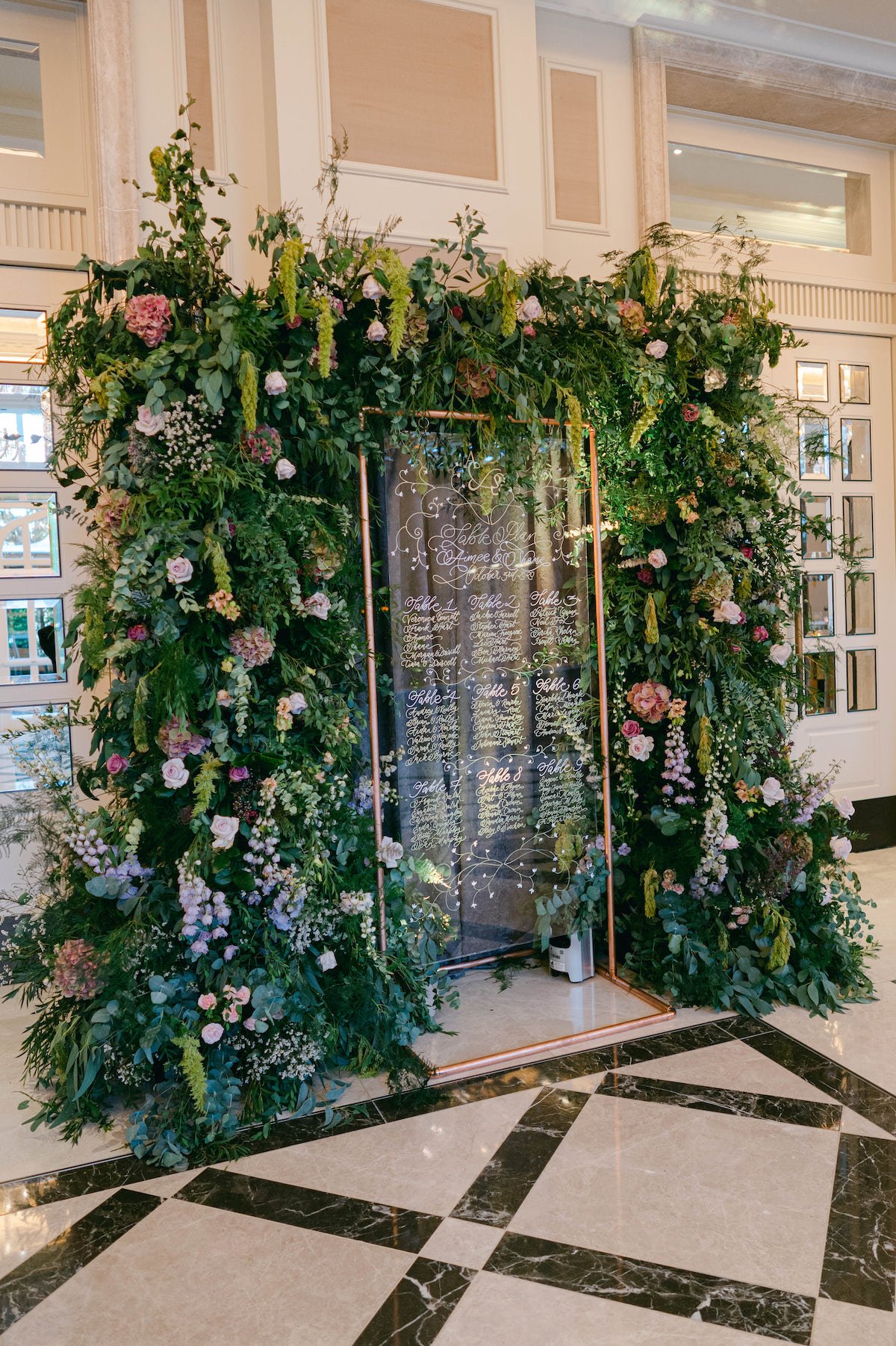 Adare Manor wedding seating chart floral arch